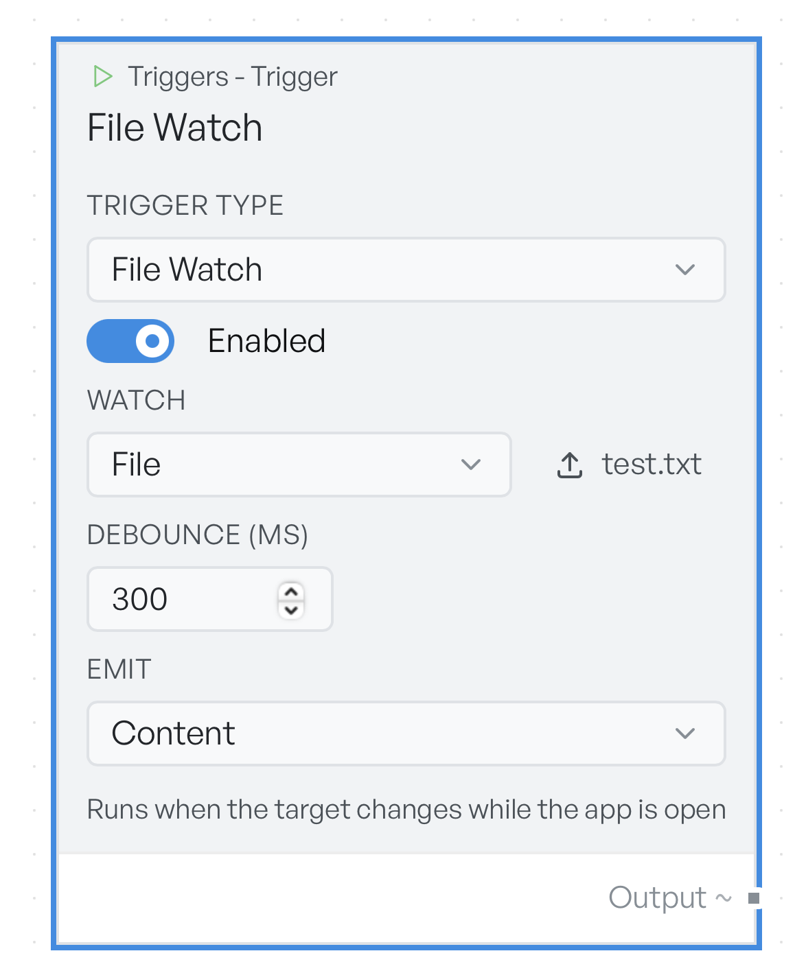 The trigger set to File Watch and enabled, watching a single file with a 300 millisecond debounce and Emit set to Content
