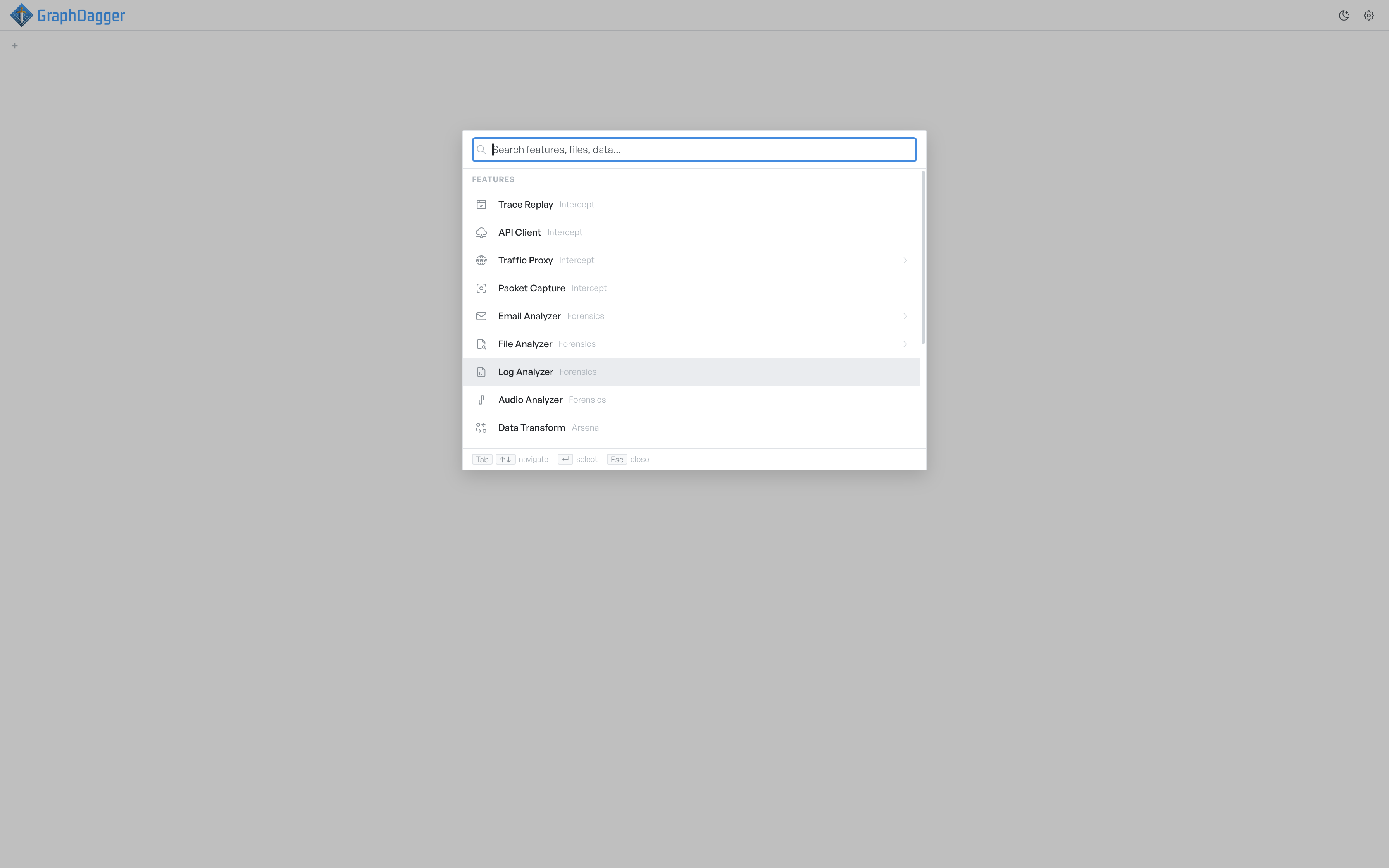 The Spotlight panel open over an empty workspace, listing every feature grouped by module